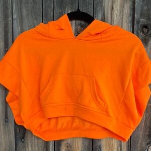Bright orange crop top